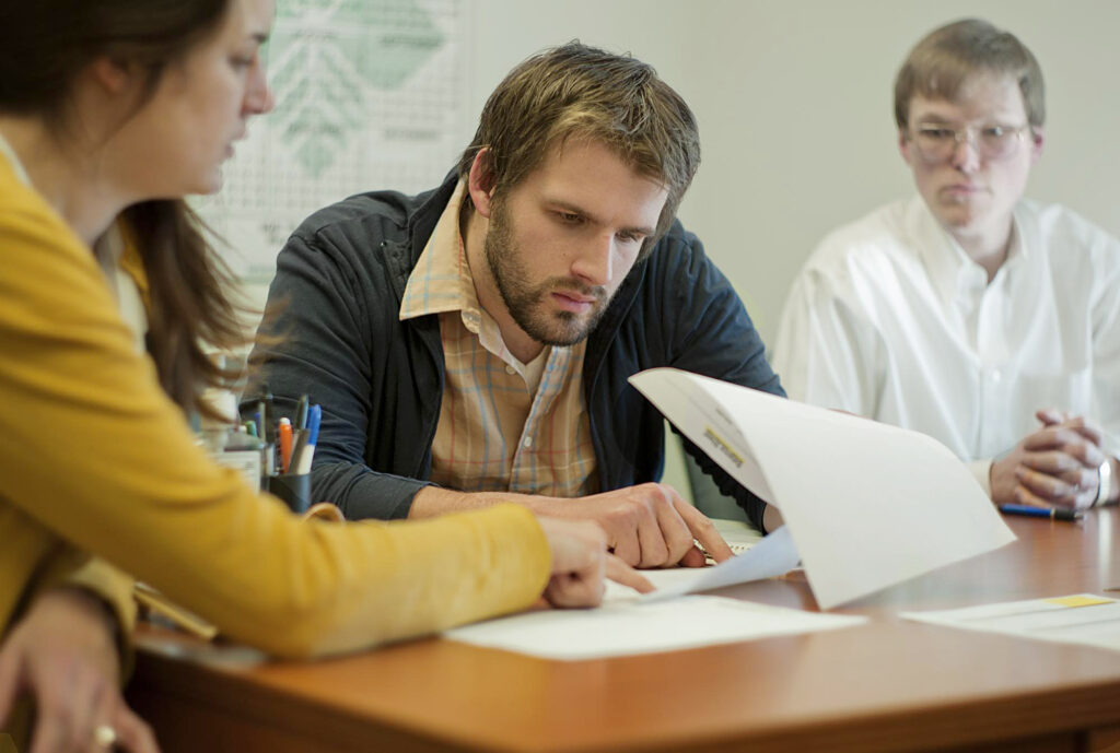 man reviewing documents