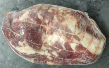 A nicely processed boneless half-shoulder roast, double-wrapped in plastic wrap and then Cryopak.