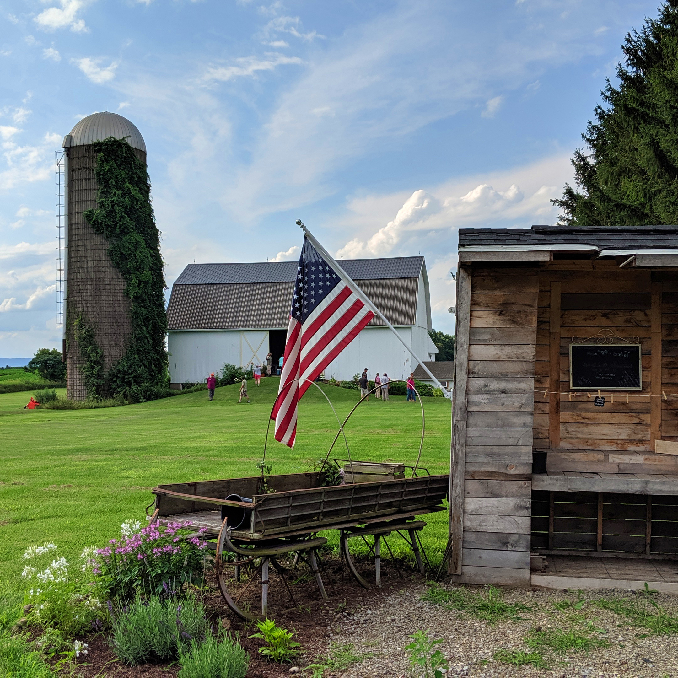 An American flag flies at a farm stand in New York
