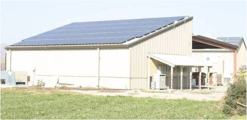Roof-mounted solar array at a California organic vegetable farm.