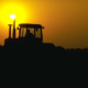 tractor at sunset