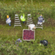 Aerial photo of workers in an apple orchard, picking apples in Shelburne, Massachusetts