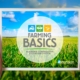 hand-held electronic device showing Farming Basics logo on screen