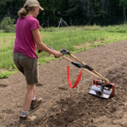 Man walking behind Drill-powered Iconoclast tool