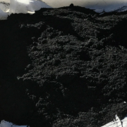 Pile of black biochar particles