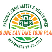 orange and green logo for National Farm SAfety and Health Week, with tractor, crop field, and wording