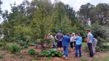 Visitors at Lawrence Community Orchard