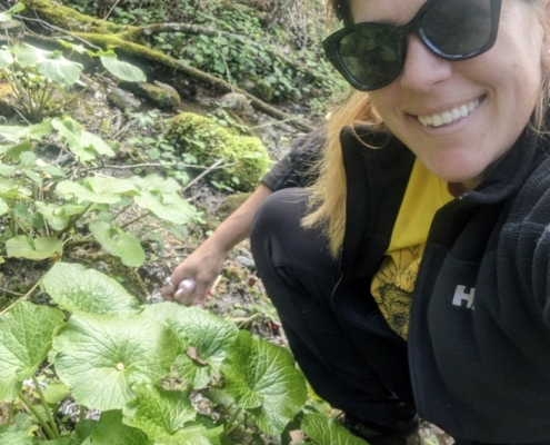 Danielle Crocker with her mature seep-grown wasabi plants