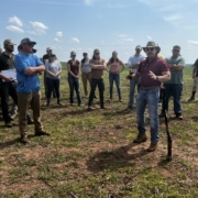 Photo of Dr. Williams performs soil evaluations with participants at a Soil for Water field day.