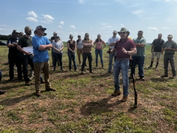 Photo of Dr. Williams performs soil evaluations with participants at a Soil for Water field day.