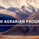 Landscape view of snowy mountains with letters New Agrarian Program superimposed