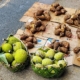 breadfruit and taro, piled in baskets and on cardboard on the pavement