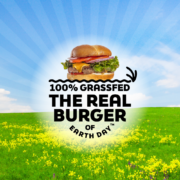 The Real Burger of Earth Day logo with a burger floating in front of blue sky and green field with yellow flowers.