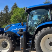 blue tractor parked outdoors