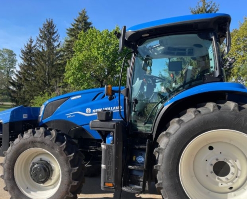 blue tractor parked outdoors