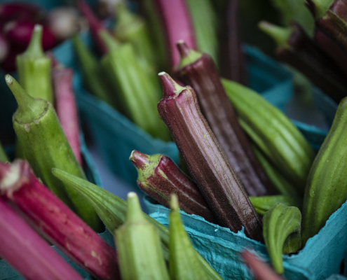 okra displayed in cartons