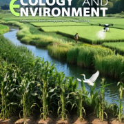 cover of Agricultural Ecology and Environment journal with cropland along a waterway