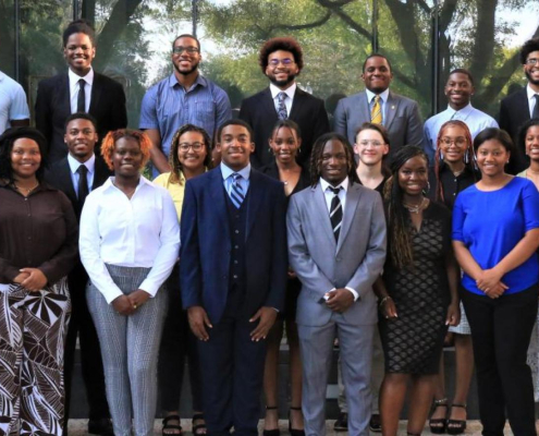 a group of students pose in rows