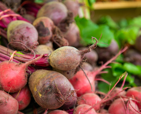bundled red beets with tops